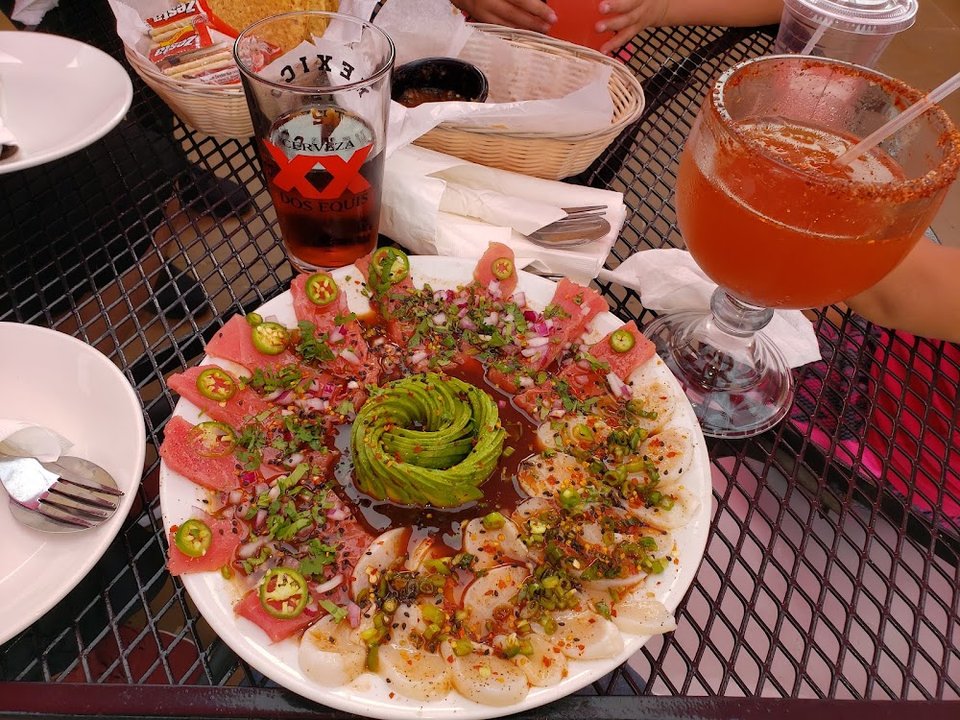 Restaurant menu with hot plates and cold plates.