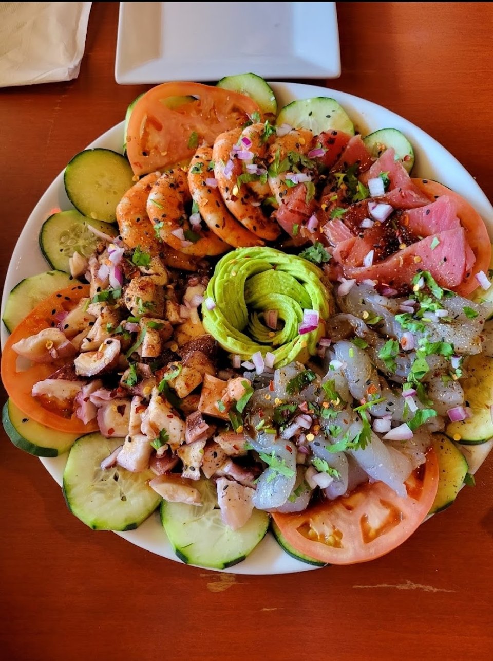 Drink and food menu for mariscos and steaks.