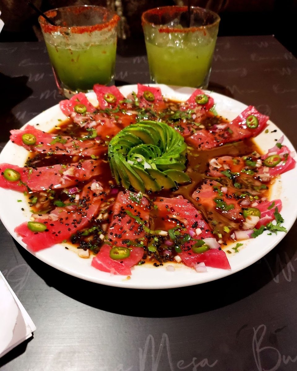 Printed menu with seafood, steak, and drinks.