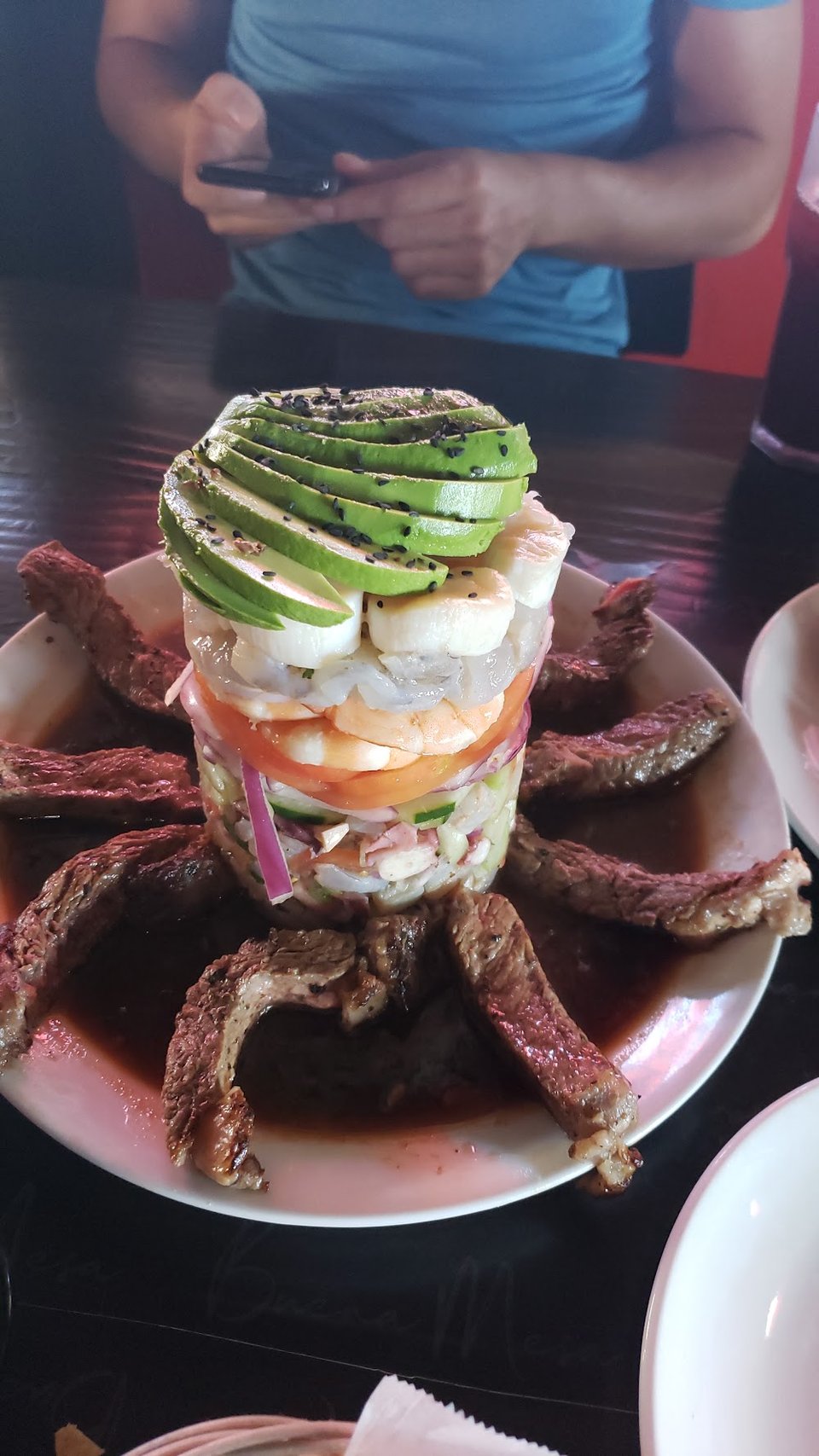 Drink and food menu for mariscos and steaks.