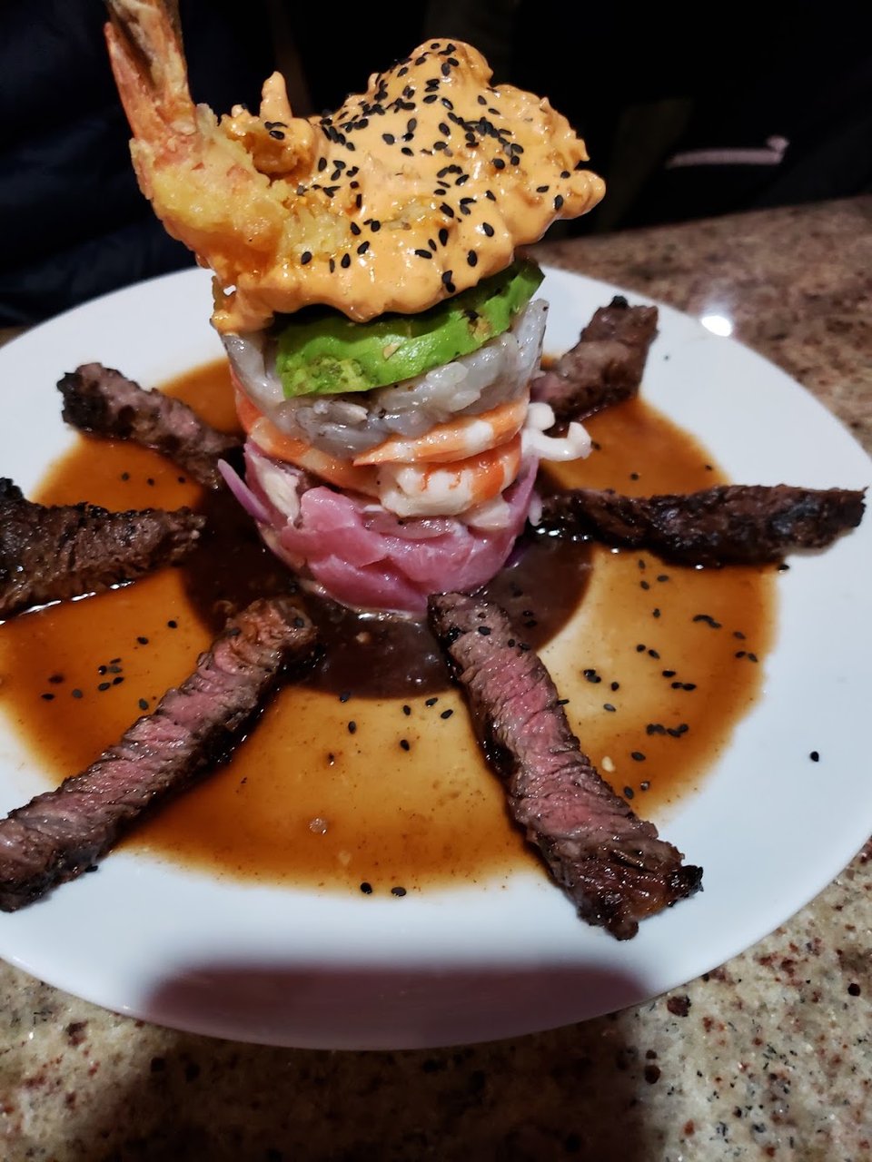 Printed menu with seafood, steak, and drinks.